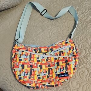 Kavu Sydney Satchel With a Semi-Circular Hobo Design In Orange/ Blue Mosiac